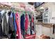 Organized walk-in closet provides ample storage space for clothing and accessories at 18492 E Oak Hill Ln, Queen Creek, AZ 85142