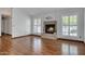Inviting living room with cozy fireplace and plantation shutters at 18802 N 71St Ln, Glendale, AZ 85308