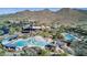 Aerial view of community with pool, water slide, and clubhouse at 1919 W Plum Rd, Phoenix, AZ 85085