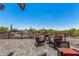 Relaxing balcony with comfortable seating and stunning views of a nearby aquatic park and landscaped desert scenery at 1919 W Plum Rd, Phoenix, AZ 85085