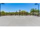 Outdoor basketball court with a fresh blacktop surface and well-maintained surroundings at 1919 W Plum Rd, Phoenix, AZ 85085