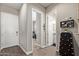 The entryway features hard surface floors, neutral walls and convenient access to other rooms in the home at 1919 W Plum Rd, Phoenix, AZ 85085
