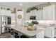 Bright kitchen featuring granite countertops, stainless steel appliances, and a large island with seating at 1919 W Plum Rd, Phoenix, AZ 85085