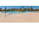 Community pool with two slides sitting under a bright blue sky on a sunny day at 1919 W Plum Rd, Phoenix, AZ 85085