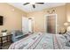 Bedroom with wood floors and closet with wire rack shelving at 1941 S Pierpont Dr # 1099, Mesa, AZ 85206