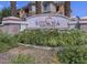Solana Condominium Homes entrance sign with lush landscaping at 1941 S Pierpont Dr # 1099, Mesa, AZ 85206