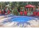 Relaxing hot tub surrounded by lounge chairs and landscaping at 1941 S Pierpont Dr # 1099, Mesa, AZ 85206