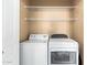 Laundry room features a washer and dryer, and a shelf at 1941 S Pierpont Dr # 1099, Mesa, AZ 85206