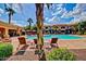 Inviting community pool with comfortable lounge chairs and well-maintained landscaping at 1941 S Pierpont Dr # 1099, Mesa, AZ 85206