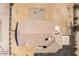 Birds eye view of the roof on this desert home with gravel landscaping and partial fencing at 20041 W Colter St, Litchfield Park, AZ 85340