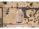 Panoramic aerial view showcasing the well-maintained property layout with a driveway, and an expansive surrounding landscape at 20041 W Colter St, Litchfield Park, AZ 85340