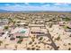 Scenic aerial view of desert homes featuring pools, large lots, and desert landscaping in the background at 20041 W Colter St, Litchfield Park, AZ 85340