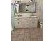 Bright bathroom with a double sink vanity and large mirror at 20041 W Colter St, Litchfield Park, AZ 85340