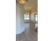 Bright dining area featuring neutral-toned walls, elegant chandelier lighting, and large window at 20041 W Colter St, Litchfield Park, AZ 85340