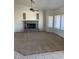 Inviting living room featuring a cozy fireplace, and carpet floors at 20041 W Colter St, Litchfield Park, AZ 85340