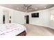 Large primary bedroom offers a ceiling fan, walk-in closet, and carpeted flooring at 20709 W Delaney Dr, Buckeye, AZ 85396