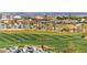 Scenic view of the community golf course featuring desert landscaping at 20709 W Delaney Dr, Buckeye, AZ 85396