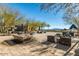 Beautiful outdoor patio area with seating and desert views at 20709 W Delaney Dr, Buckeye, AZ 85396