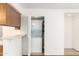 Convenient in-unit laundry closet featuring a stacked washer and dryer at 2146 W Isabella Ave # 131, Mesa, AZ 85202