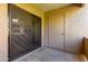 Outdoor patio with door to storage, and sliding glass doors to interior at 2146 W Isabella Ave # 131, Mesa, AZ 85202