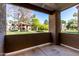 Outdoor patio with views of building exteriors and lush landscaping at 2146 W Isabella Ave # 131, Mesa, AZ 85202