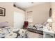 Cozy bedroom with twin beds, a closet, neutral walls, and carpeted flooring at 21563 N Greenway Rd, Maricopa, AZ 85138