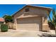 Close up of the two car garage of this single Gathering house at 21563 N Greenway Rd, Maricopa, AZ 85138
