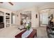 Open-concept living area flows into the kitchen, perfect for entertaining guests at 21563 N Greenway Rd, Maricopa, AZ 85138