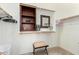 Walk-in closet with shelves and a mirror, offering ample storage and a dressing area at 21563 N Greenway Rd, Maricopa, AZ 85138
