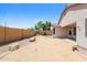 Backyard featuring mature landscaping, a privacy fence, and desert landscaping at 2401 W Ellis St, Phoenix, AZ 85041