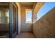 Outdoor balcony with textured columns and railing at 2406 N 142Nd Ave, Goodyear, AZ 85395
