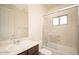 Clean bathroom with a shower-tub combo and single vanity, creating a convenient space for daily routines at 2406 N 142Nd Ave, Goodyear, AZ 85395