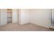 Bedroom with private entrance to balcony and walk-in closet at 2406 N 142Nd Ave, Goodyear, AZ 85395