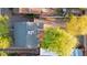 Aerial view of homes, landscaping and shade trees, with decorative gravel and stone walkways visible at 2534 N 10Th St, Phoenix, AZ 85006