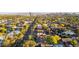 High aerial perspective of a tree-lined residential street with city skyline views in the distance at 2534 N 10Th St, Phoenix, AZ 85006