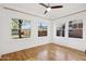 Bright bedroom with hardwood floors and multiple windows offering natural light at 2534 N 10Th St, Phoenix, AZ 85006