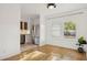 Cozy dining area adjacent to the kitchen with hardwood floors and natural light at 2534 N 10Th St, Phoenix, AZ 85006