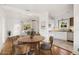 Open-concept view of the dining room, living room, and kitchen featuring an abundance of natural light at 2534 N 10Th St, Phoenix, AZ 85006