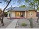 Charming brick bungalow with a welcoming front porch and desert landscaping at 2534 N 10Th St, Phoenix, AZ 85006