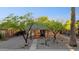 Charming brick house with desert landscaping, walkway, and a cozy covered front porch with bench seating at 2534 N 10Th St, Phoenix, AZ 85006