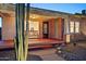 Charming home featuring a cozy covered porch with bench seating, xeriscaping, and updated entrance at 2534 N 10Th St, Phoenix, AZ 85006