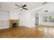 Bright living room with hardwood floors, fireplace, built-ins, and ample natural light at 2534 N 10Th St, Phoenix, AZ 85006