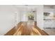 Bright and airy living space with hardwood floors, leading to a well-appointed, modern kitchen at 2534 N 10Th St, Phoenix, AZ 85006
