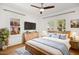 Comfortable bedroom with a ceiling fan, natural light, and ample closet space at 2534 N 10Th St, Phoenix, AZ 85006
