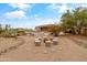 Backyard features landscaping with seating at 3019 W Trail Dr, Phoenix, AZ 85086