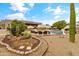 Desert home backyard featuring pool, landscaping, and plenty of space to relax at 3019 W Trail Dr, Phoenix, AZ 85086