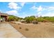 Desert backyard featuring a pool, spa, landscaping, and plenty of space at 3019 W Trail Dr, Phoenix, AZ 85086