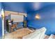 Entertaining basement with a projector screen, arcade game, and comfortable seating at 3019 W Trail Dr, Phoenix, AZ 85086