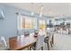 Light and airy dining room with a large window and direct access to the kitchen at 3019 W Trail Dr, Phoenix, AZ 85086