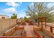 Backyard garden with brick lined planting beds at 3019 W Trail Dr, Phoenix, AZ 85086